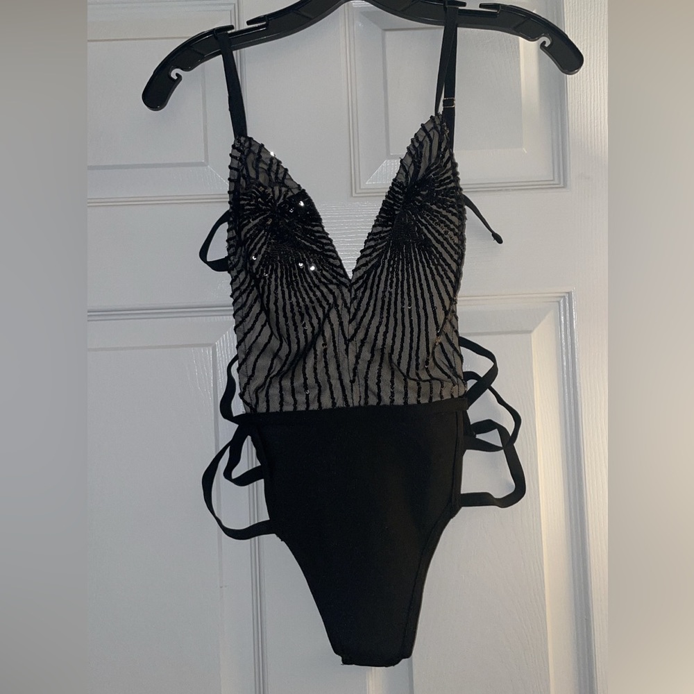 Superdown black and sequin body suit. Brand new with tags.